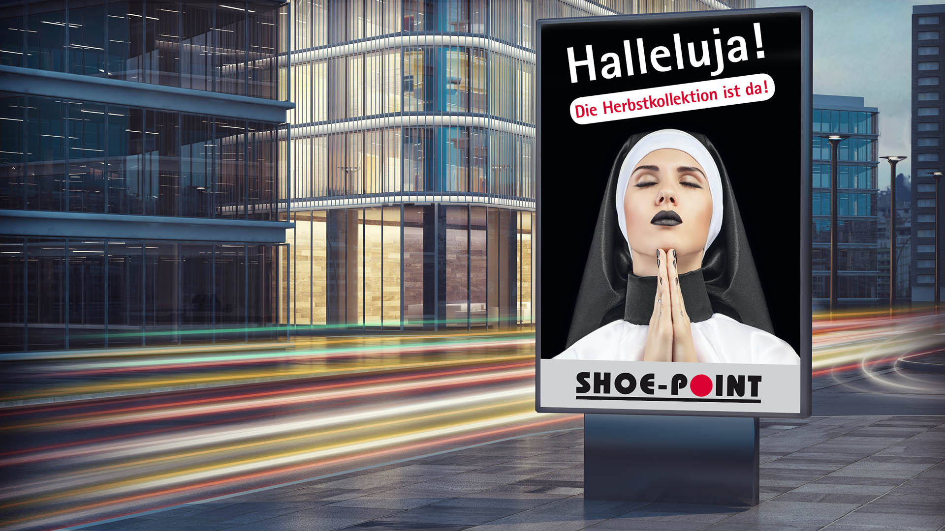Scribble Werbeagentur nah bei Mönchengladbach zeigt eine Nonne auf einem City-Light-Poster.